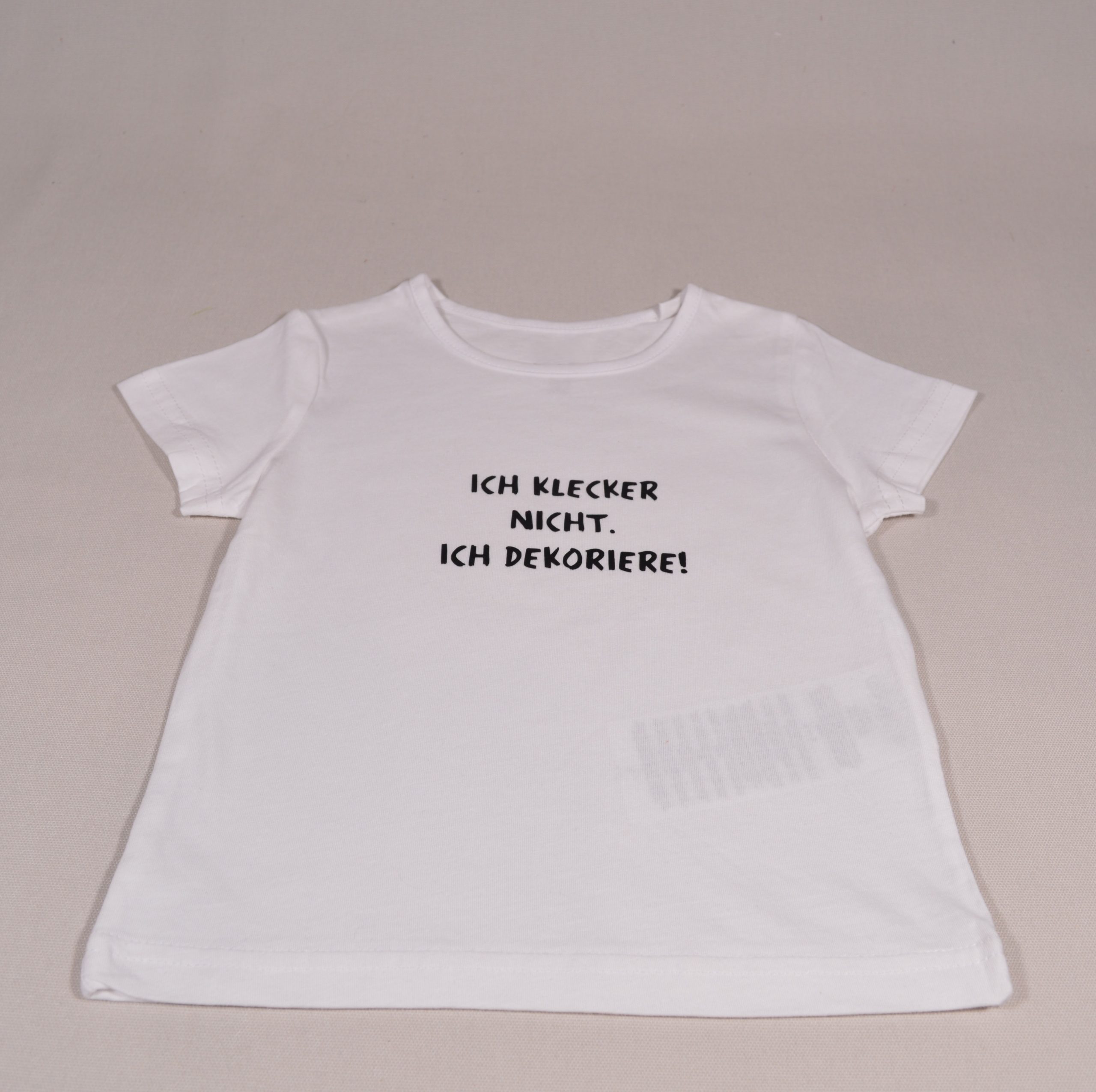 Baby T-Shirt Spruch Ich kleckere nicht ich dekoriere weiss
